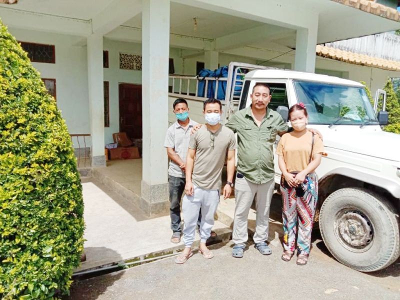 (Left to Right) Atsung (teacher), Rev Henpao and Naro (teacher) pose for the lens before setting out for Noklak to distribute the donated books.